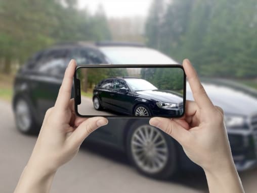 carrusel de imágenes audi persona que toma una foto de un audi