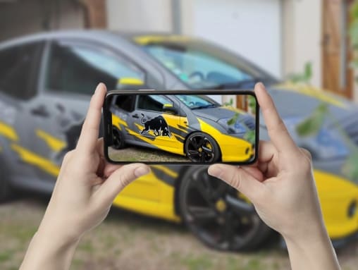 imagen de carrusel c3 persona tomando una foto de un c3