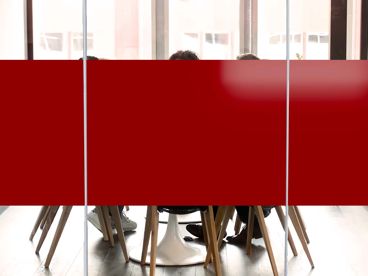 Meeting room equipped with red opaque film