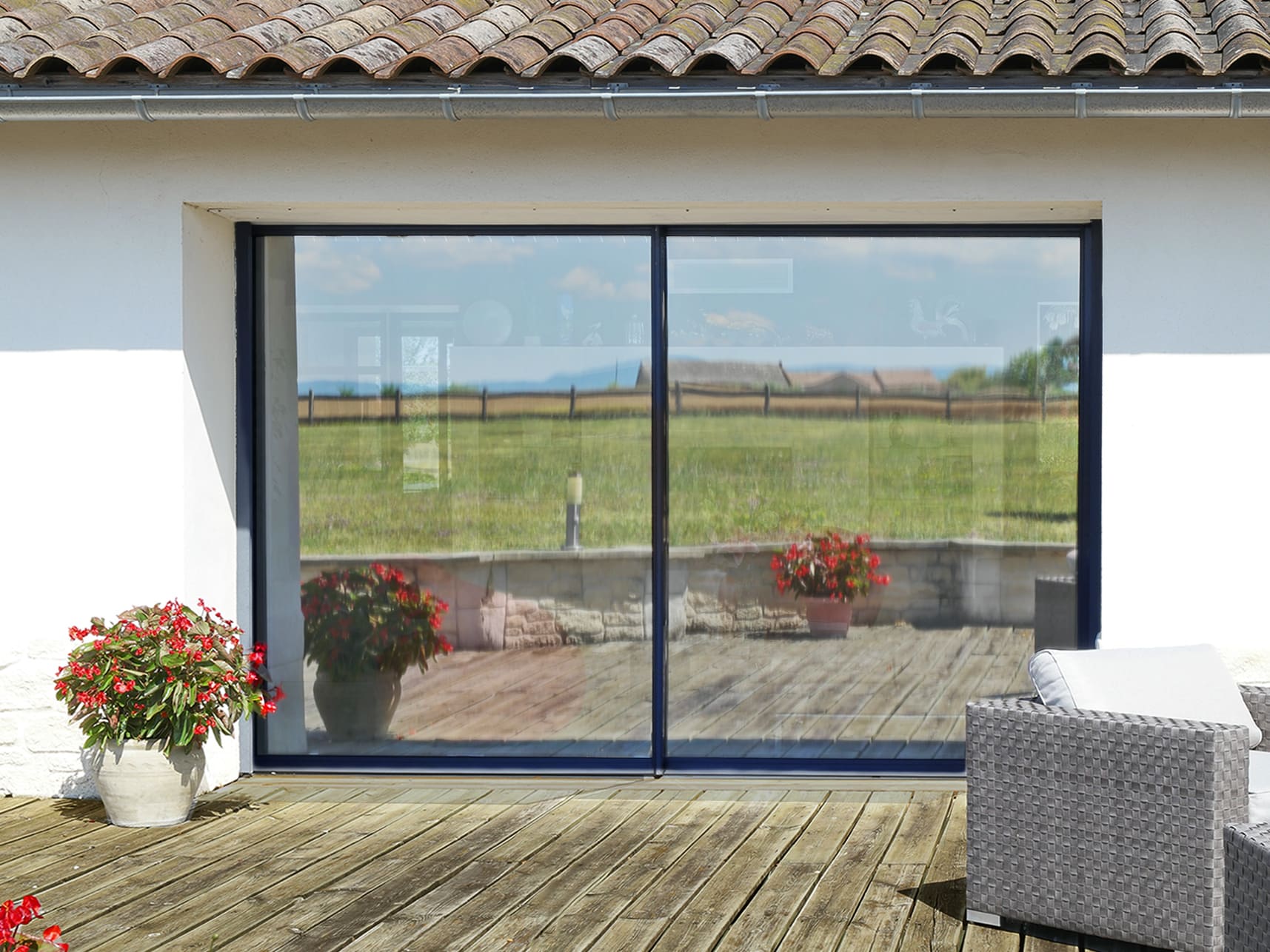 - Luminis Films - Particulier Vitrage équipé du film repositionnable solaire argent clair en vue extérieure