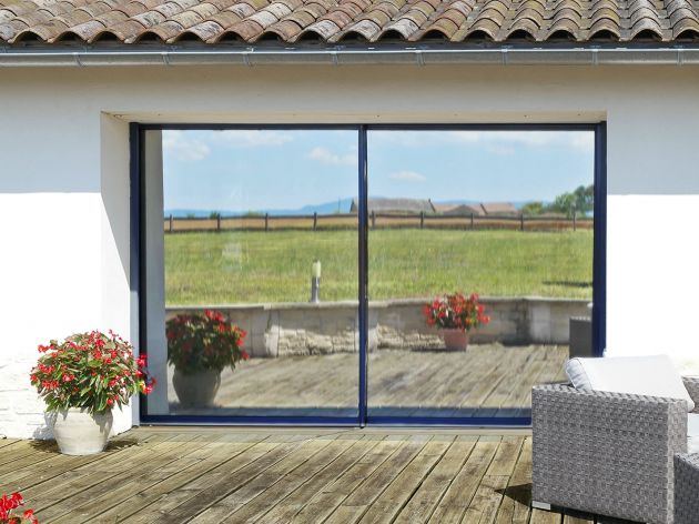- Luminis Films - Particulier film solaire pour vitrage électrostatique couleur argent pris de vue extérieure